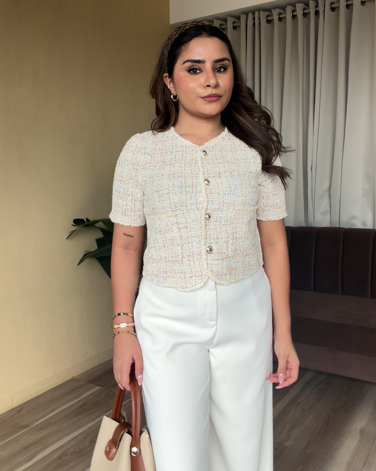 Cream Textured Cut Sleeve Vest Detailing Top