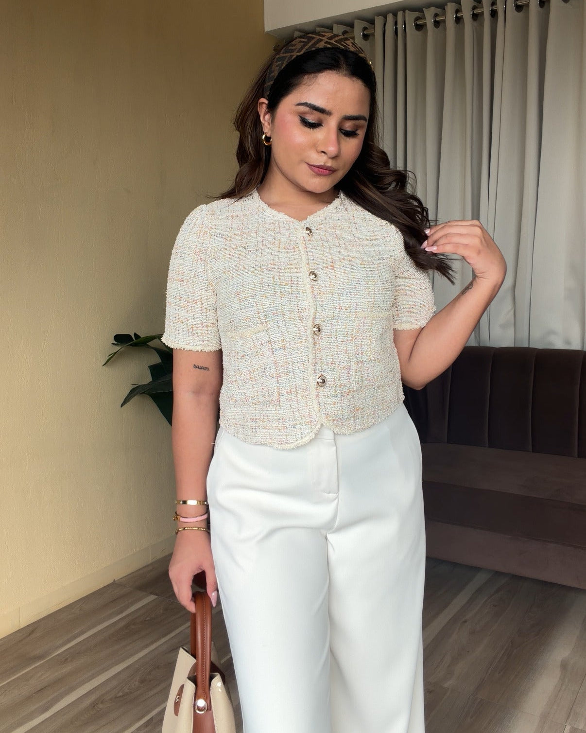 Cream Textured Cut Sleeve Vest Detailing Top