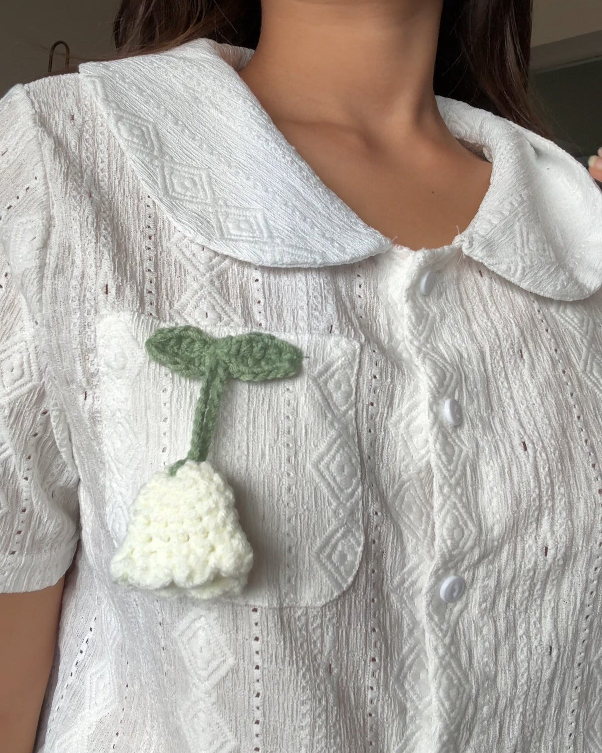 Textured summer shirt with crochet flower detailing
