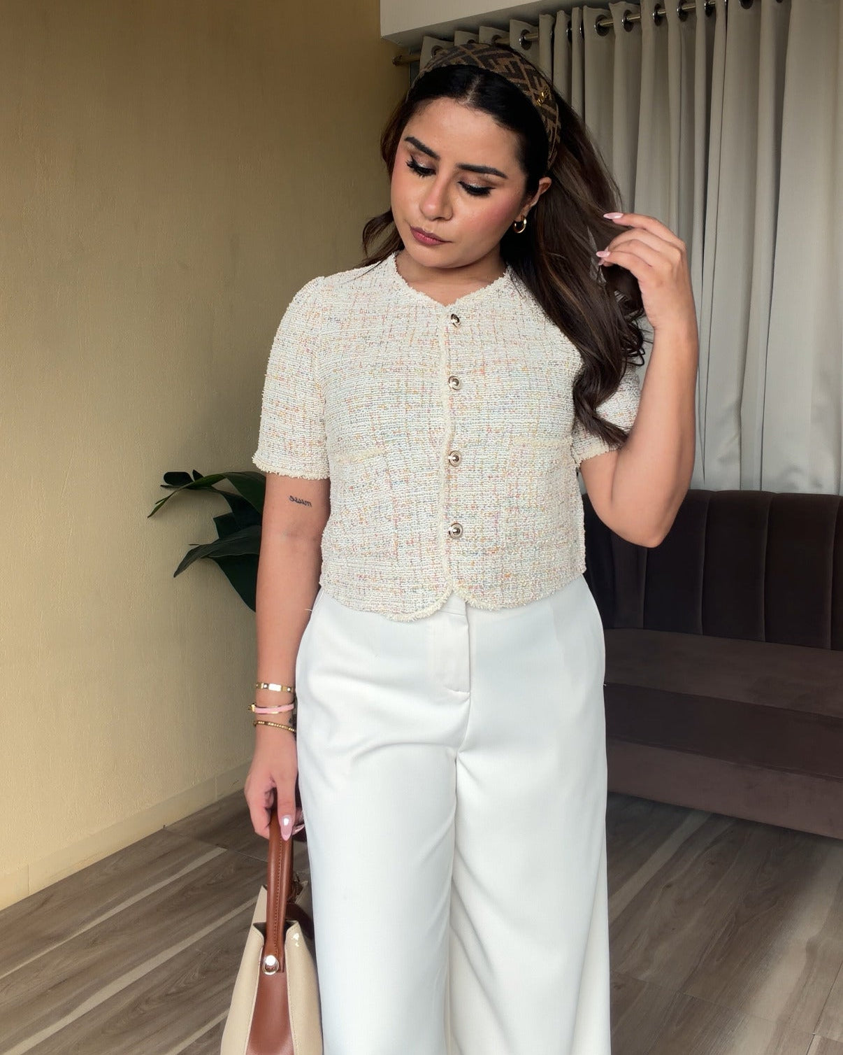 Cream Textured Cut Sleeve Vest Detailing Top